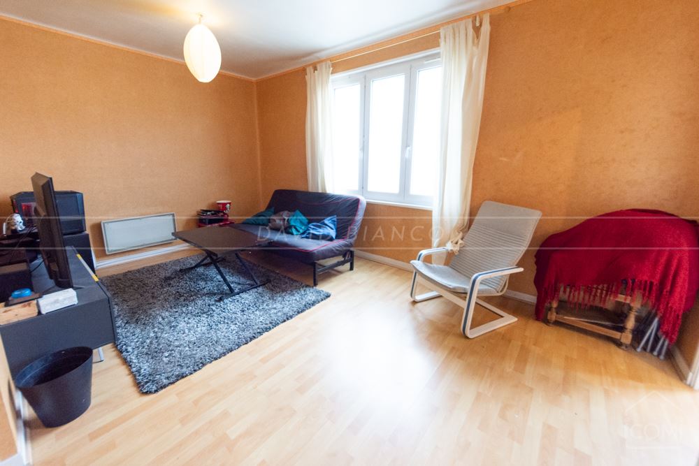IMMEUBLE AVEC UN LOCAL COMMERCIAL DE 115M² ET UN T3 LOUE DE 65M² photo 4