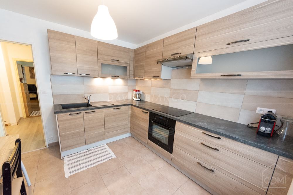 APPARTEMENT T5 100M² AVEC ASCENSEUR, BALCON, PARKING PRIVE ET CAVE photo 2