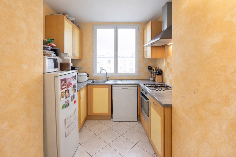 APPARTEMENT DE 1967 T4 DE 61M² AU 2EME ETAGE SUR 4 SUR DALLE BETON AVEC CAVE ET CHAUFFAGE GAZ INDIVIDUEL photo 4