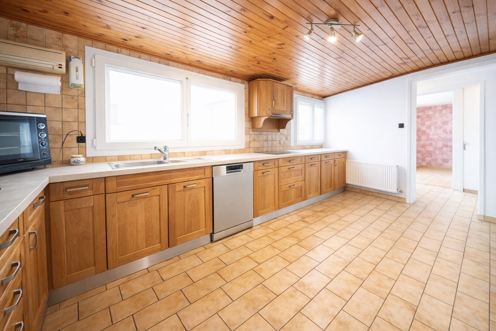 MAISON DES ANNEES 60 - ESPACE DE VIE EN REZ DE JARDIN - 3 CHAMBRES - EXPO SUD - PROXIMITE TRAMWAY - CALME photo 3