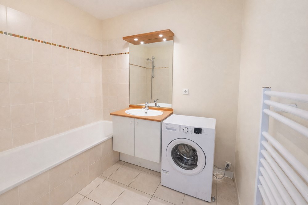 APPARTEMENT T2 43M² AVEC CAVE, PLACE DE PARKING PRIVEE, ASCENSEUR ET GRANDS ESPACES VERTS photo 5