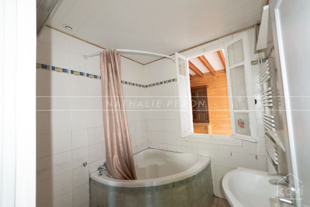 MAISON - 90 M2 AVEC 2 CHAMBRES - VERANDA ET TERRASSE SUR UN TERRAIN DE 700M² ENVIRON photo 4