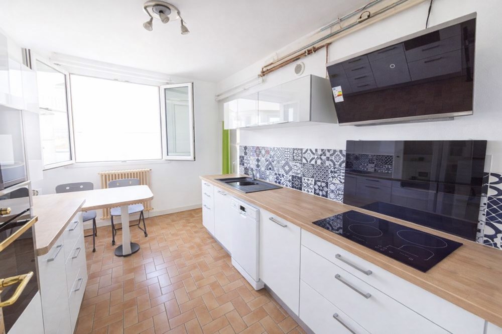 APPARTEMENT T4 75M² DALLE BETON AVEC ASCENSEUR, BALCON FERME ET GARAGE EN OPTION