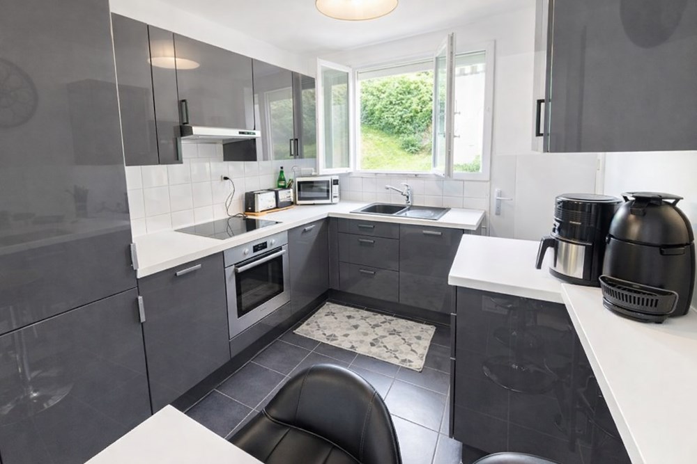 APPARTEMENT T4 80M² - DALLE BETON - NOMBREUX RANGEMENTS - FIBRE - GARAGE EN OPTION photo 2