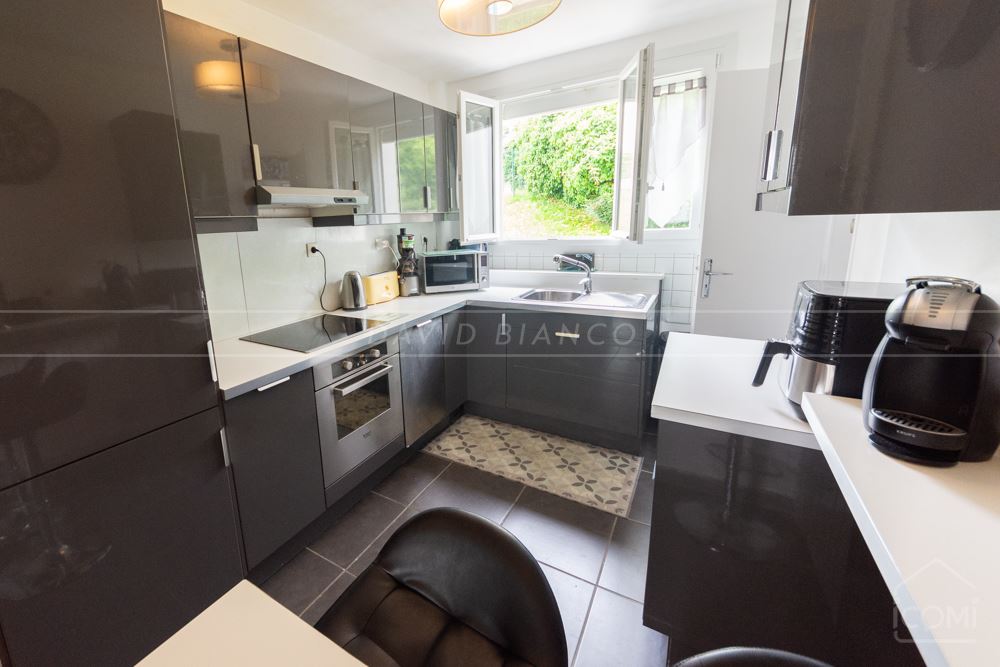 APPARTEMENT T4 80M² - DALLE BETON - NOMBREUX RANGEMENTS - FIBRE - GARAGE EN OPTION photo 2