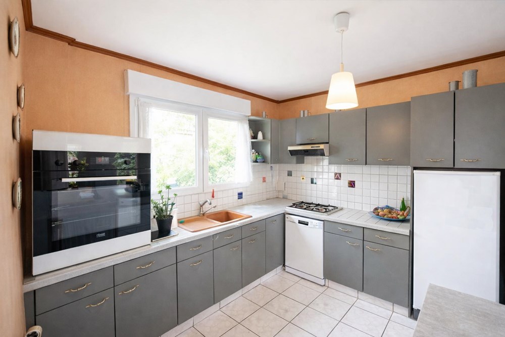 MAISON - 3 CHAMBRES - PIECE DE VIE DE 56 M² - EXPOSITION SUD - QUARTIER CALME - REZ DE JARDIN photo 2