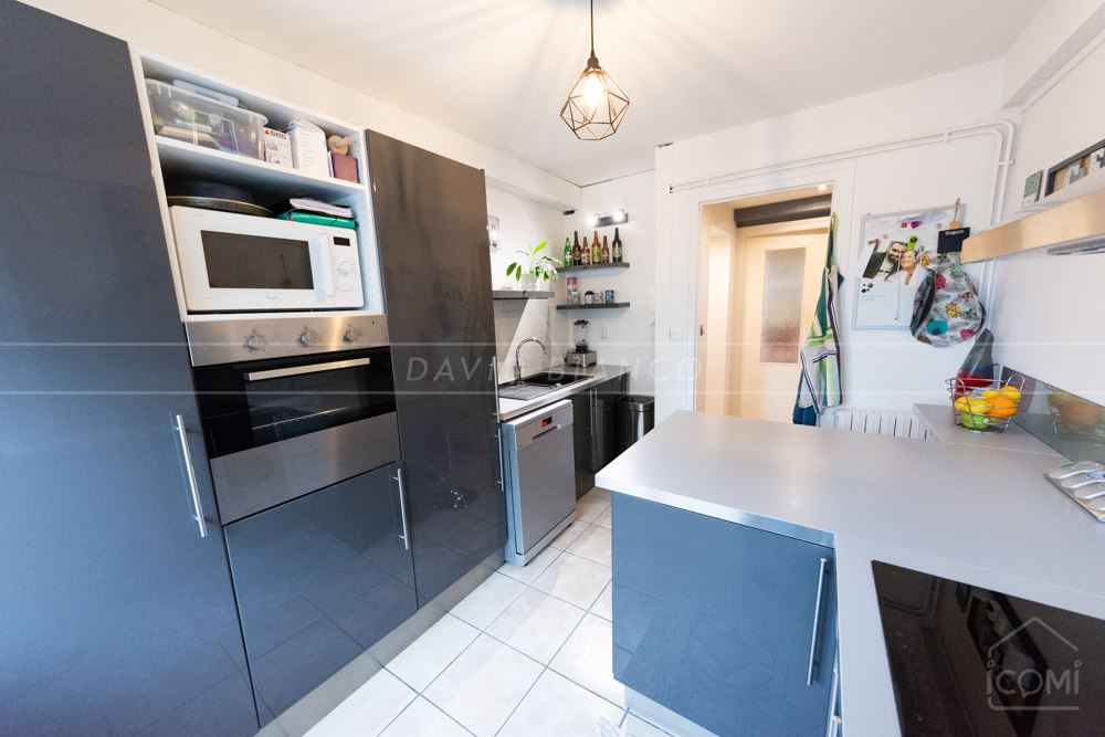 APPARTEMENT T5 84M² AVEC 3 CHAMBRES - GRANDE PIECE DE VIE LUMINEUSE - NOMBREUX RANGEMENTS - CAVE photo 3