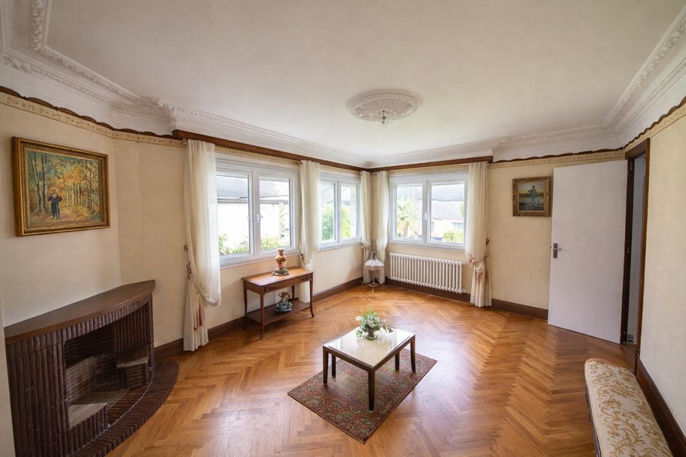 MAISON DE QUALITE - 3/5 CHAMBRES - TERRASSE - CALME - CAVE - GARAGE - TERRAIN DE 500M² ENVIRON - RARE photo 2