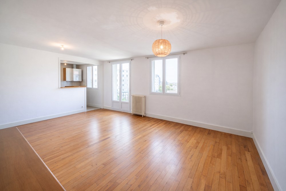 APPARTEMENT T4 - GRANDE PIECE DE VIE - CENTRE VILLE SECTEUR GARE - 2 CHAMBRES - CAVE - EXPOSITION OUEST