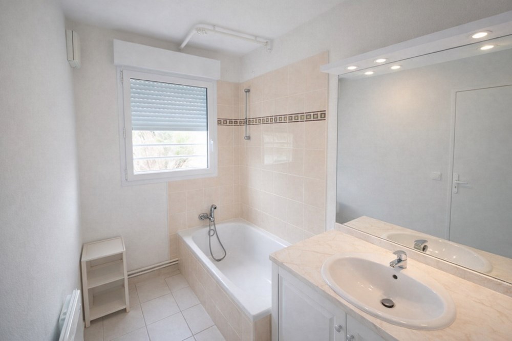 APPARTEMENT 51M² - BALCON - RESIDENCE DE STANDING - PISCINE - PROCHE CENTRE VILLE photo 4