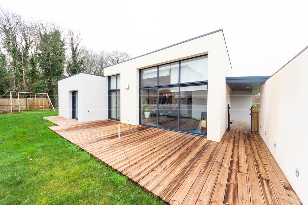 MAISON INDIVIDUELLE DE 2015 T4 107M² PLAIN PIED AVEC DE NOMBREUX RANGEMENTS GARAGE BUREAU ET BUANDERIE SUR TERRAIN CLOS DE 400M² photo 2