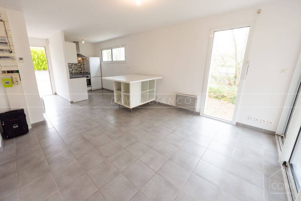 APPARTEMENT T3 52M² AVEC TERRASSE JARDIN PRIVATIF DE 85M² ET PLACE DE PARKING PRIVEE