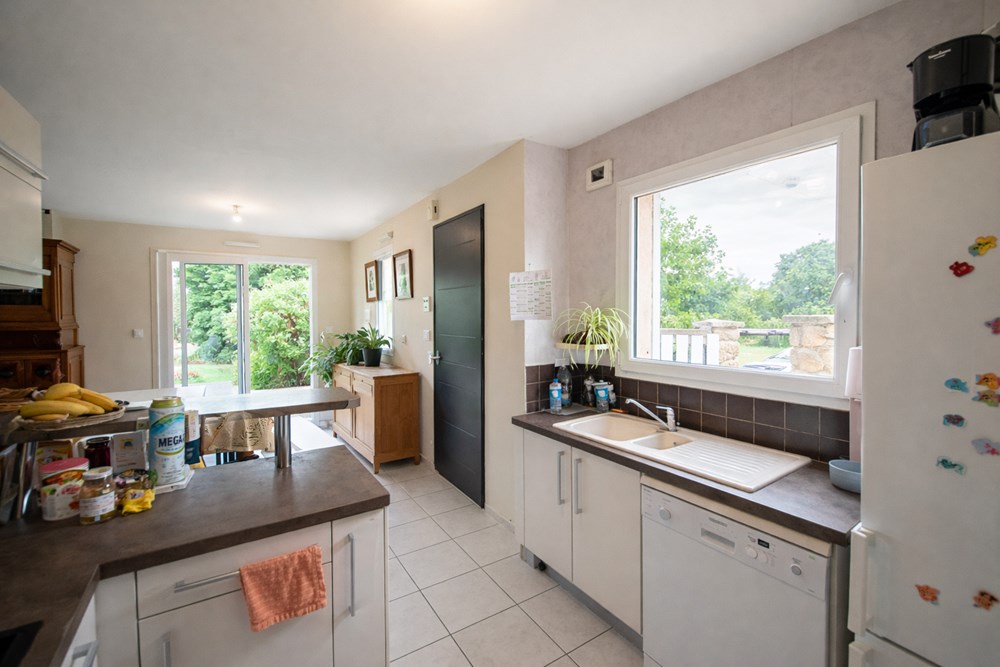 QUARTIER MARREGUES - MAISON BBC DE 2010 - 3 CHAMBRES - GARAGE - GRAND JARDIN DE 1330M² - RARE photo 3