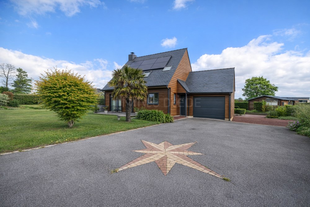 MAISON EN BOIS CONTEMPORAINE NON MITOYENNE DE 115 M² AVEC UN BEAU TERRAIN CONSTRUCTIBLE DE 1000 M² SANS VIS-A-VIS ET GARAGE photo 2