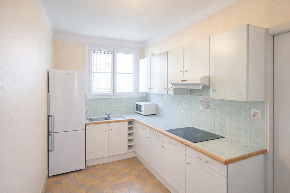 APPARTEMENT - LUMINEUX - SANS VIS A VIS - 2 CHAMBRES - GARAGE - CAVE - DALLE BETON photo 2