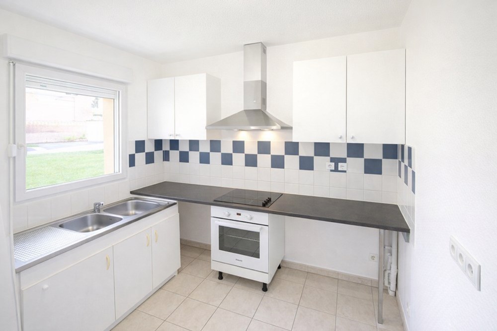 BREST KERINOU- APPARTEMENT T3 DE 64 M²- DEUX CHAMBRES- CALME ET LUMINEUX - RESIDENCE SECURISEE - PLACE DE PARKING photo 3