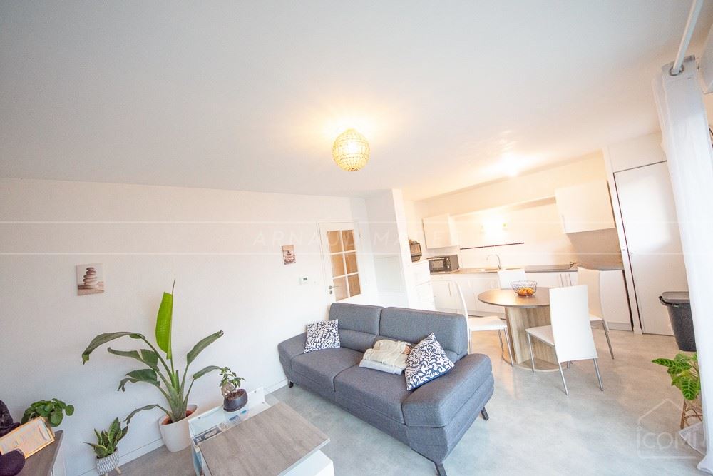 APPARTEMENT T2 DE STANDING - BELLE PIECE DE VIE AVEC TERRASSE - PARKING - RECENT - RARE photo 4