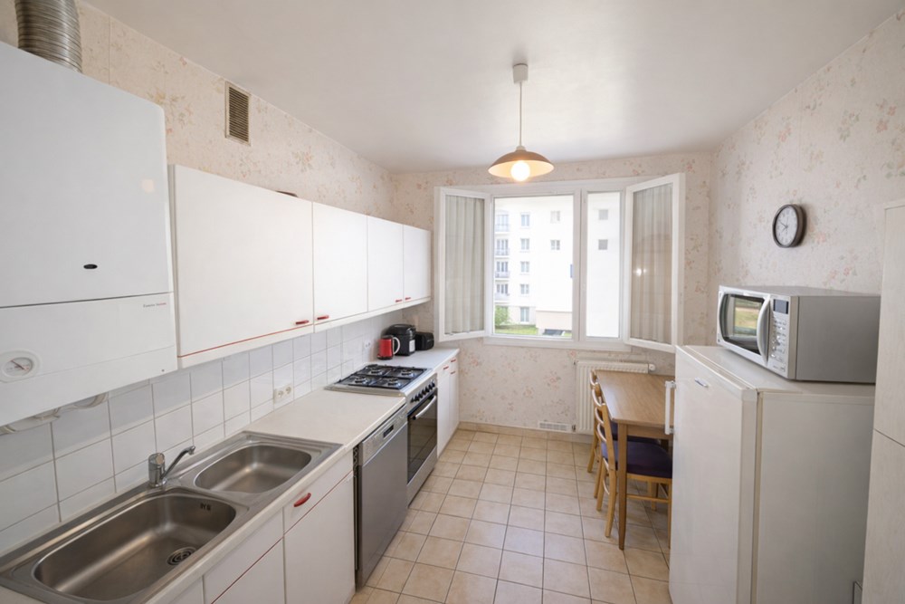 APPARTEMENT 75 M² - 2 CHAMBRES - DALLE BETON - PROCHE ECOLES - GARAGE INDEPENDANT - CAVE photo 2