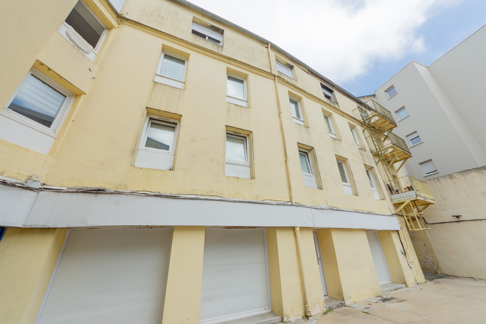 IMMEUBLE 300M² R+3 - 13 LOGEMENTS LOUES (STUDIOS AVEC SALLE D'EAU ET KITCHINETTE) photo 2