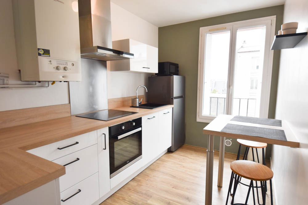 SECTEUR MONTAIGNE - APPARTEMENT DE 53 M2 - 2 CHAMBRES - SANS TRAVAUX -ELECTRICITE REFAITE - STATIONNEMENT AISE AU PIED DE L'IMMEUBLE - CAVE photo 2