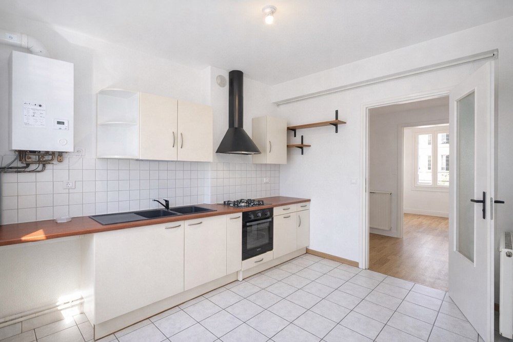 APPARTEMENT - 2 CHAMBRES - AUCUNS TRAVAUX - LUMINEUX - IDEALEMENT SITUE - RARE SUR LE MARCHE photo 2