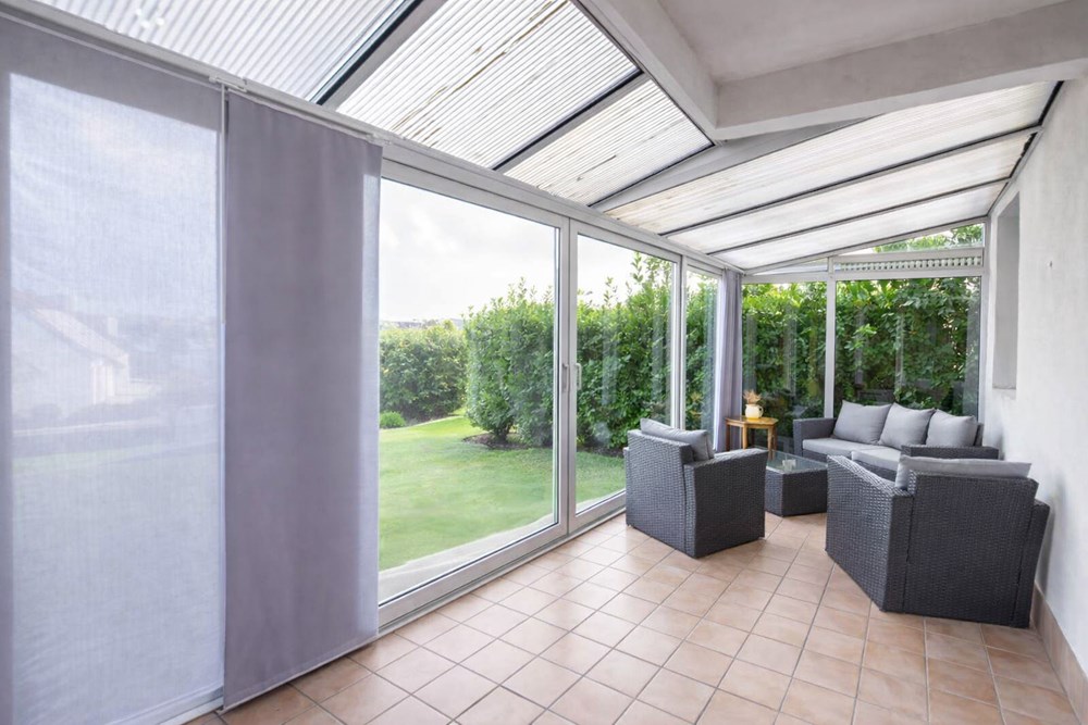 APPARTEMENT - T2 DE 53 M2 - EXCELLENT DPE C - SANS TRAVAUX - VERANDA DE 17 M2 - JARDIN PRIVATIF - GARAGE