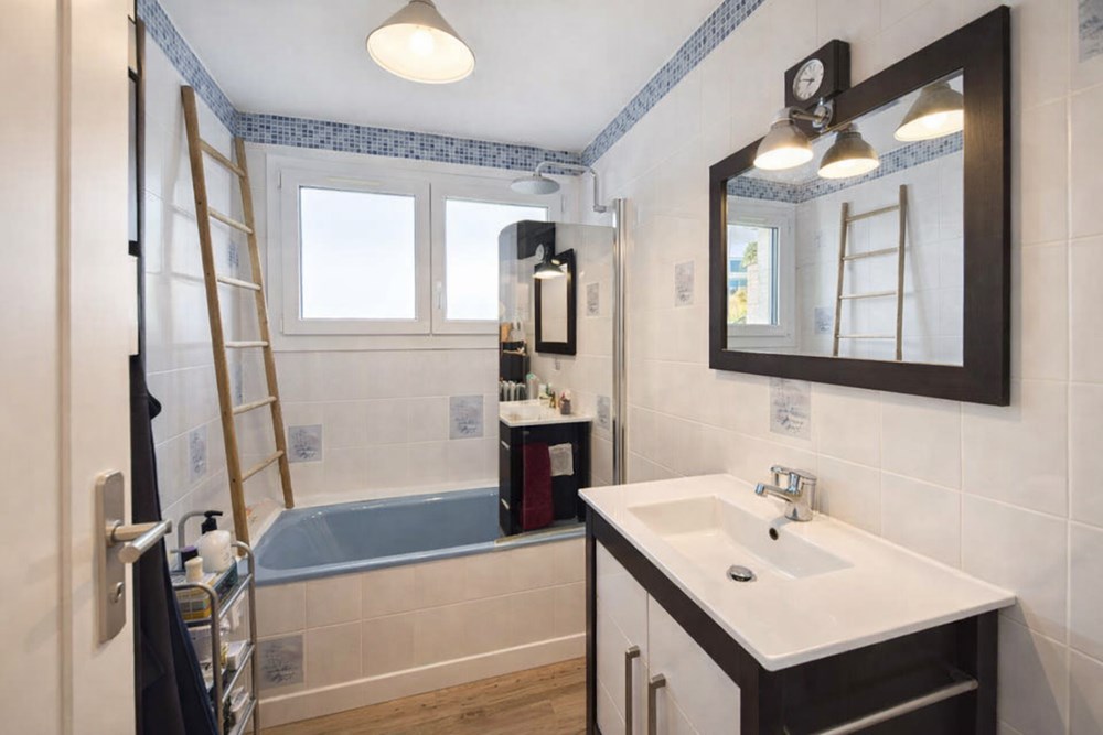 APPARTEMENT DE 70 M2 - 2 CHAMBRES - LUMINEUX - SANS TRAVAUX - DALLE BÉTON - CAVE - FAIBLES CHARGES photo 4