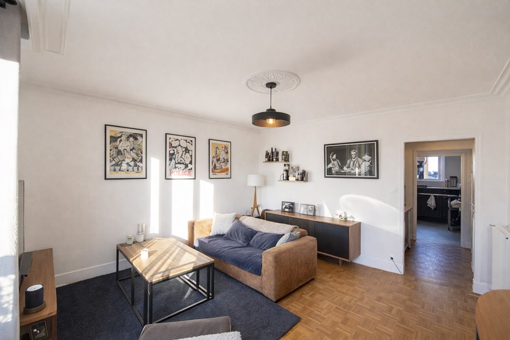 APPARTEMENT 65M² - SANS TRAVAUX - DERNIER ETAGE - 2 CHAMBRES - CAVE - GARAGE - PROCHE COMMERCES photo 2