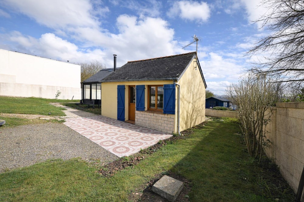 PETITE MAISON DE VACANCES - 2 VERANDAS - EXTENTION POSSIBLE - TERRAIN DE 2000 M2 - A PROXIMITE DES COMMERCES ET COMMODITES. photo 5