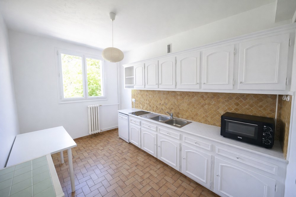 APPARTEMENT 2 CHAMBRES - RUE MAURICE RAVEL - TRES LUMINEUX - SANS TRAVAUX- IDEAL PREMIER ACHAT - PROCHE COMMODITES photo 2