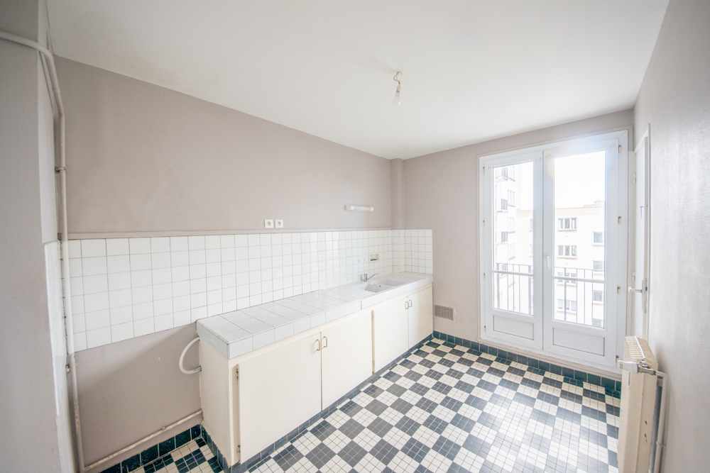 APPARTEMENT 60M² - DEUX CHAMBRES - ASCENSEUR - RESEAU DE CHALEUR URBAIN - BALCON - GARAGE