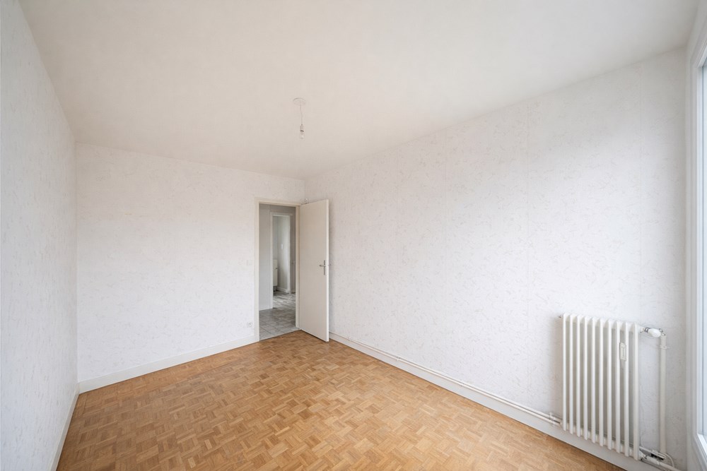 APPARTEMENT 60M² - DEUX CHAMBRES - ASCENSEUR - RESEAU DE CHALEUR URBAIN - BALCON - GARAGE photo 5