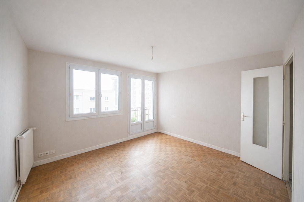 APPARTEMENT 60M² - DEUX CHAMBRES - ASCENSEUR - RESEAU DE CHALEUR URBAIN - BALCON - GARAGE