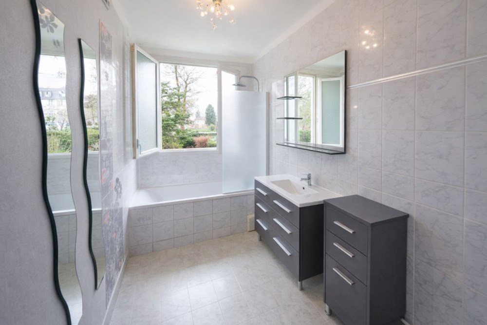 APPARTEMENT T4 83M² RDC SURELEVE - 3 CHAMBRES - DALLE BETON - CAVE 15M² - BEAU POTENTIEL photo 5