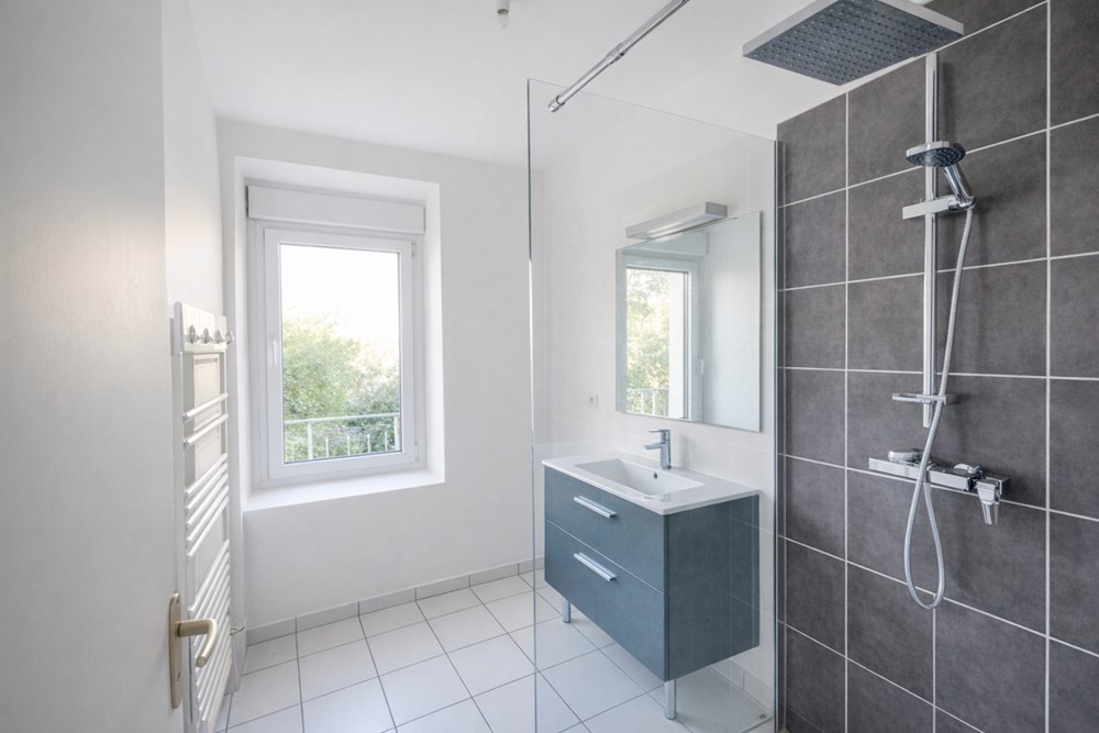 APPARTEMENT DUPLEX T3 55M² - DALLE BETON - 2 CHAMBRES - DERNIER ETAGE - PETITE COPROPRIETE - PAS DE TRAVAUX - CAVE BETONNEE photo 5