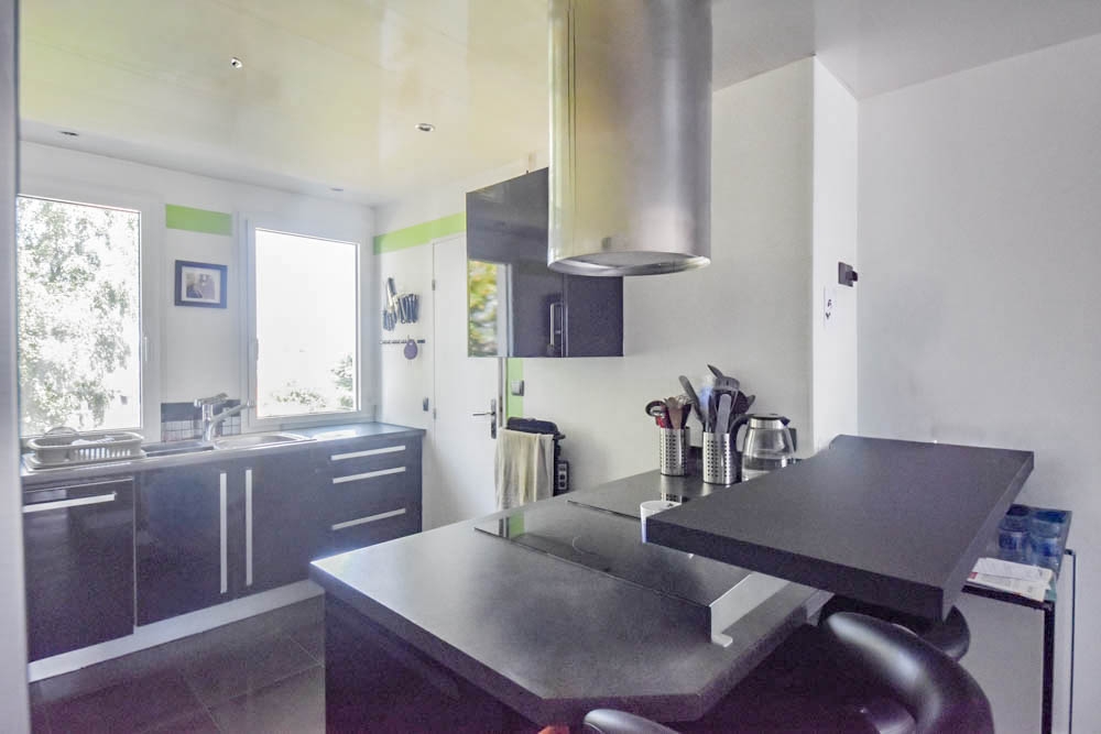 APPARTEMENT DE 96 M² - 3 CHAMBRES (4 POSSIBLE) - PIECE DE VIE DE 50 M² - 3 BALCONS - ASCENSEUR - PLACE DE PARKING - EXPOSITION SUD - CAVE - DPE C photo 4